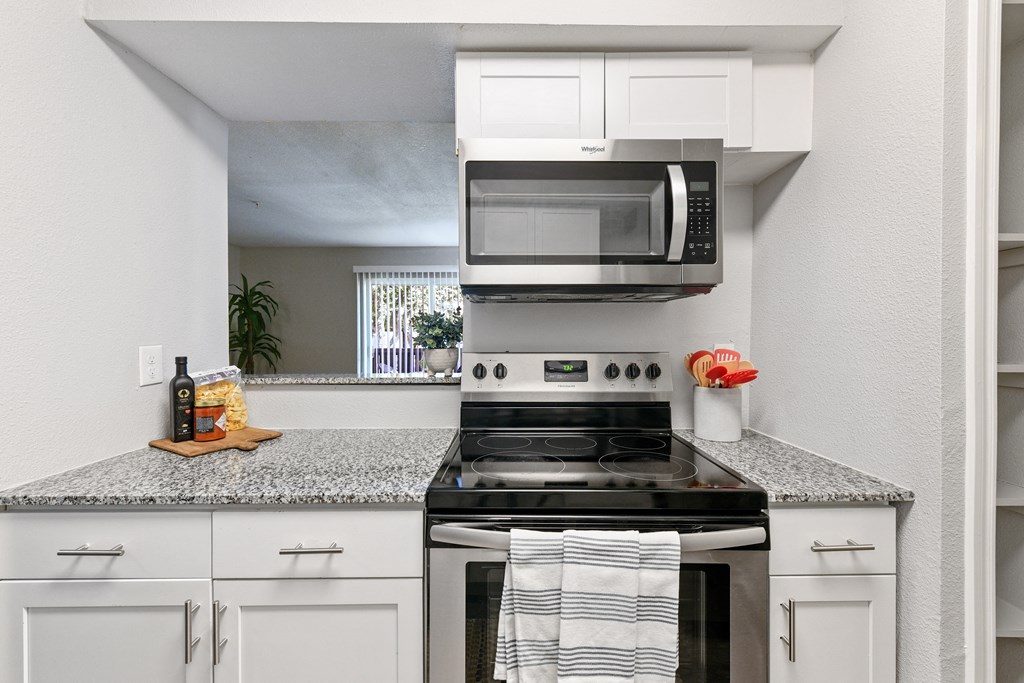 the preserve at ballantyne commons apartment kitchen with stainless steel appliances