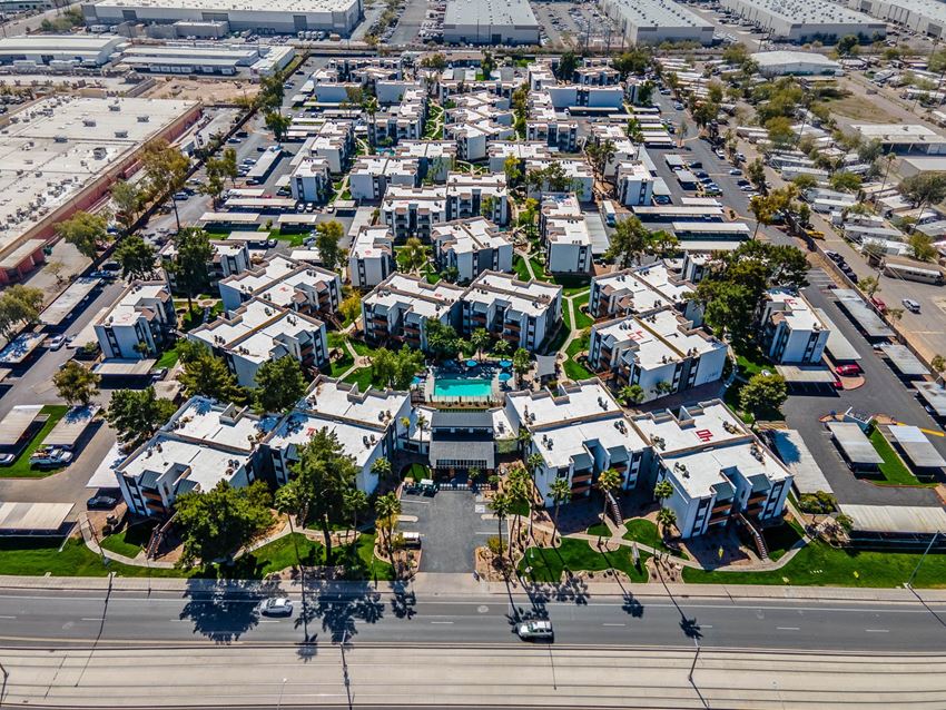 an aerial view of rows of houses with a swimming pool in the middle - Photo Gallery