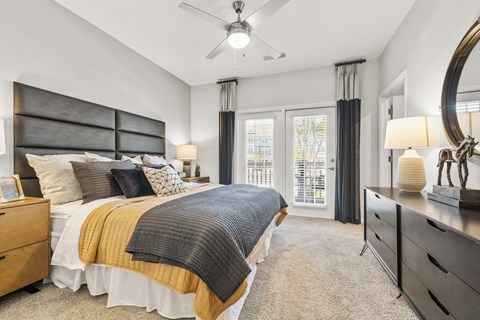 Langley Pointe Apartments | Bedrooms w/ Patio Access