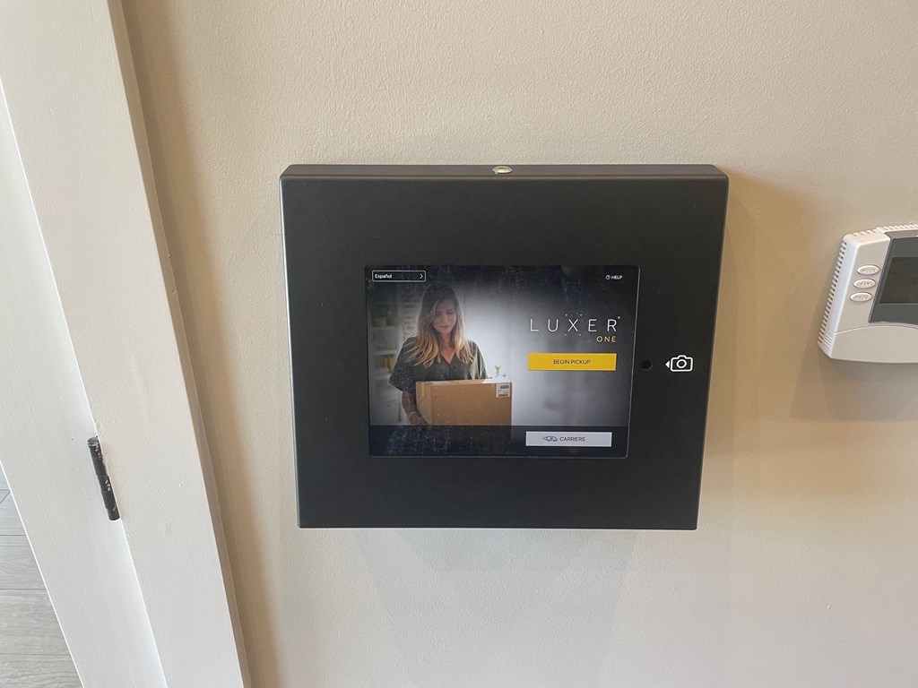 Langley Pointe Apartments | Luxer Package Room