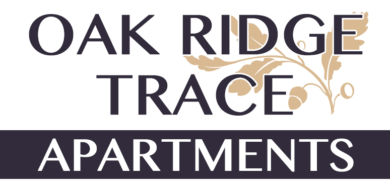 The image is a logo for Oak Ridge Trace Apartments.