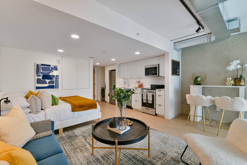 a living room with a couch and a table