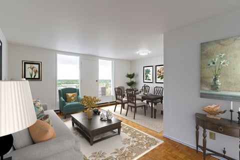 a living room and dining room with a couch and a table