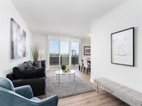 a living room with a couch and a table