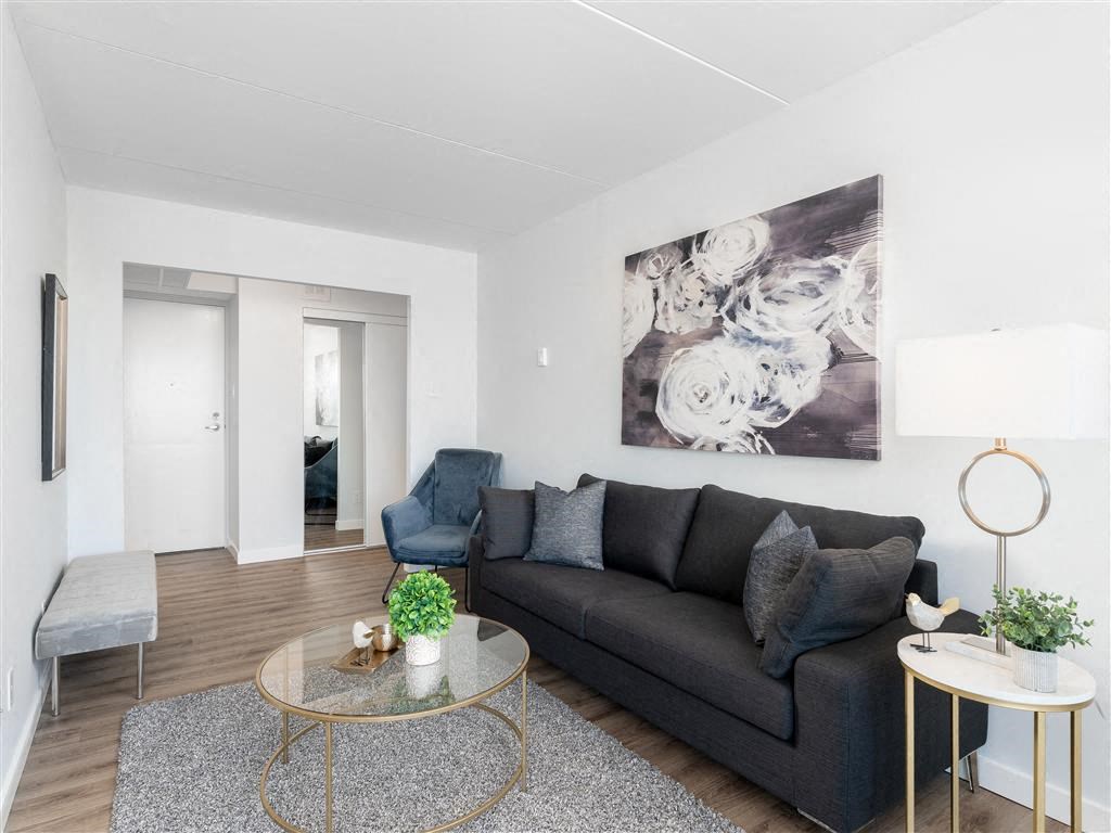 a living room with a couch and a table