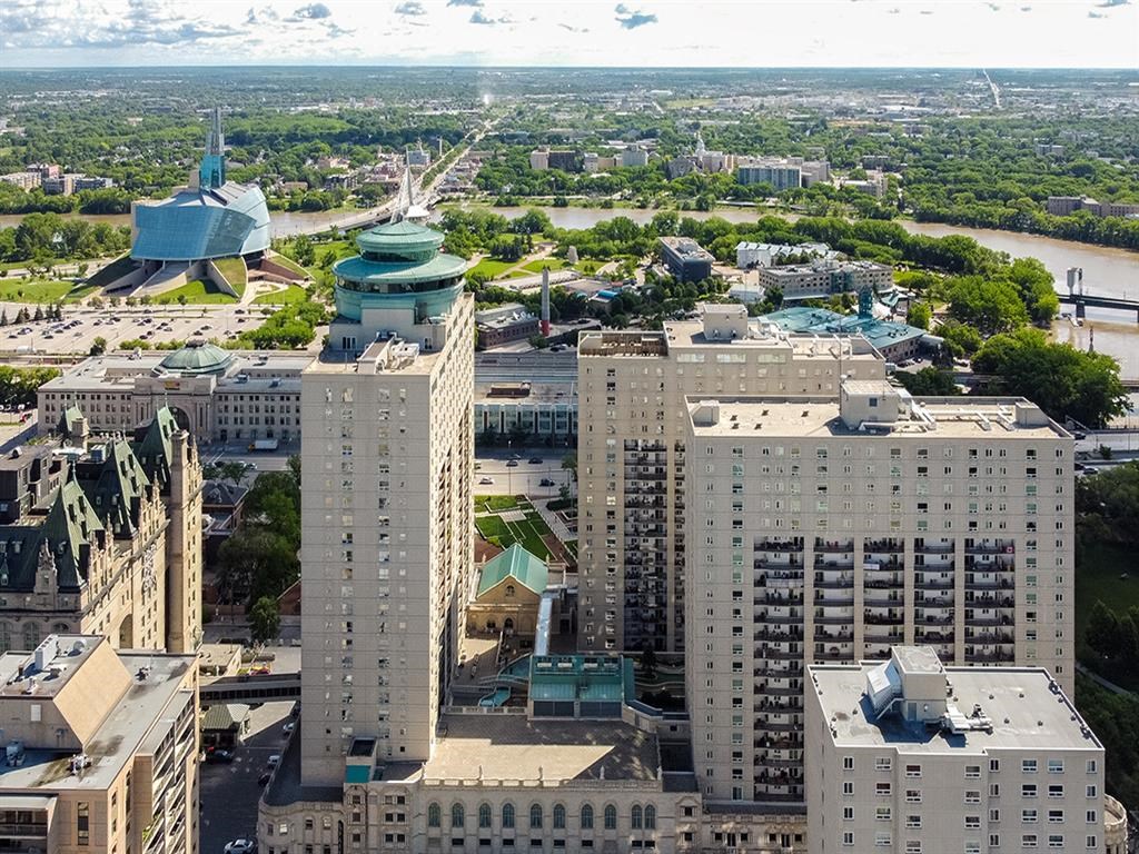 a view of the city from the top of a skyscraper