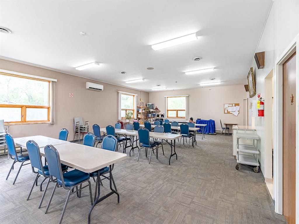 a dining room with tables and chairs