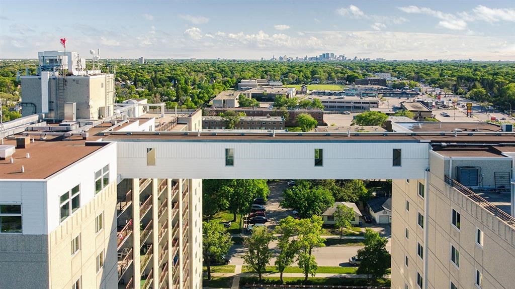 a view of the city from the top of a building