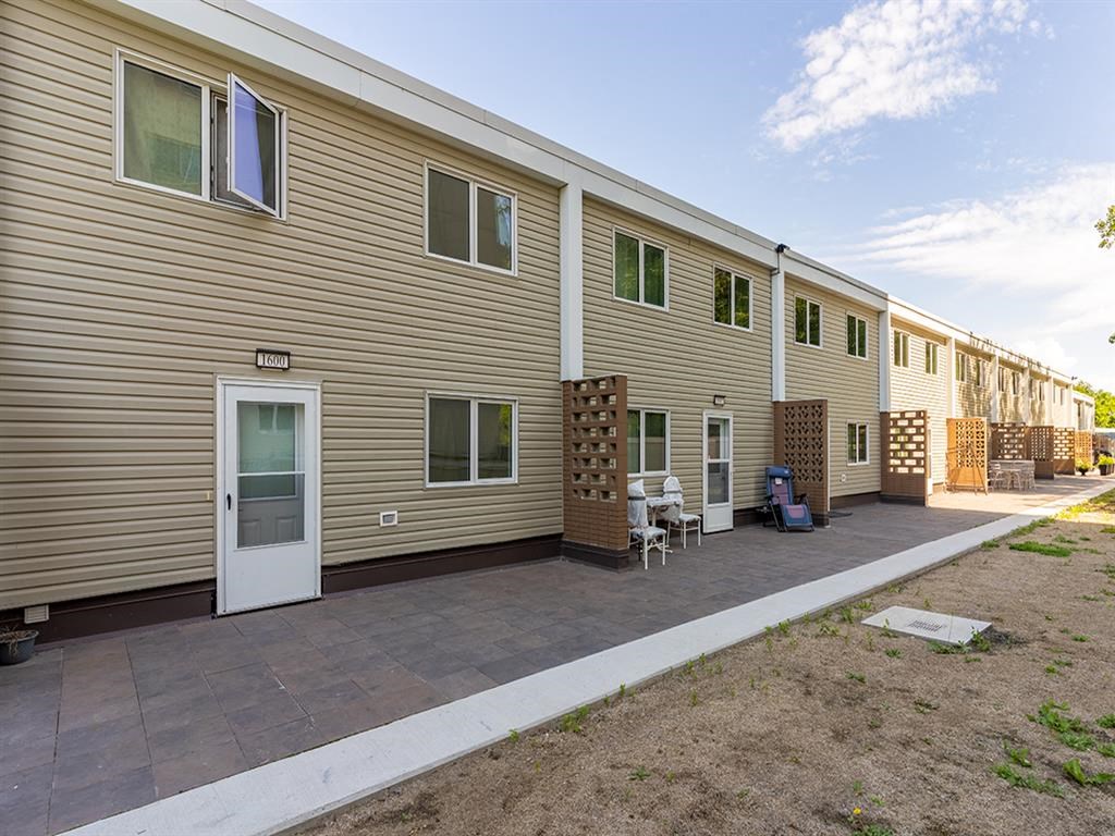 a building with a patio in front of it