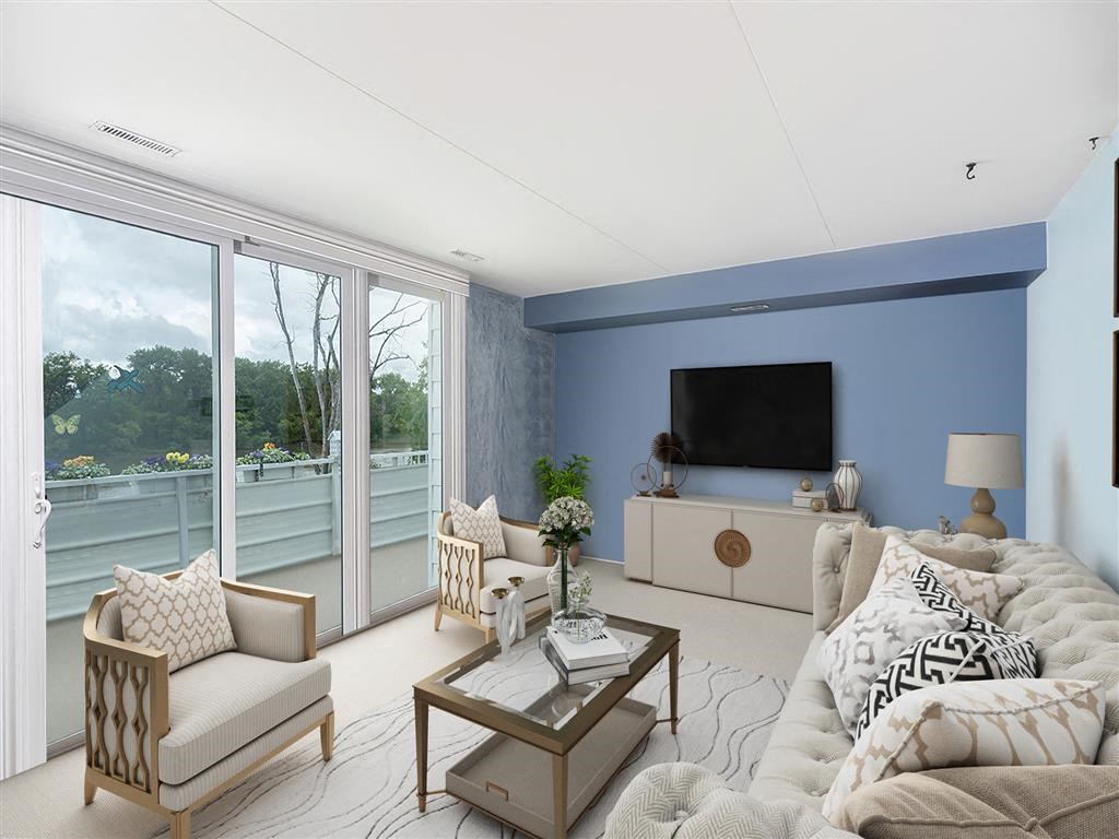 a living room with a couch and a television