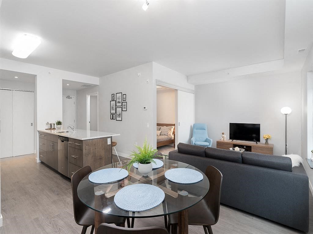 a living room with a table and a couch