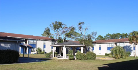 A building with a blue sky in the background.