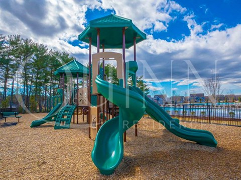 a playground with slides and a swing set
