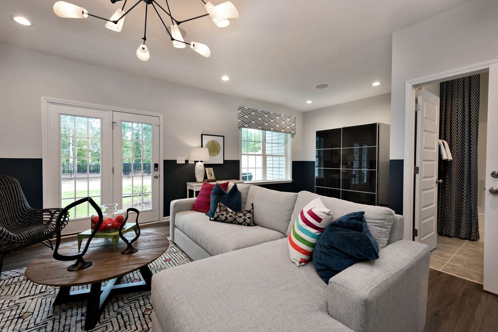a living room with a couch and a table
