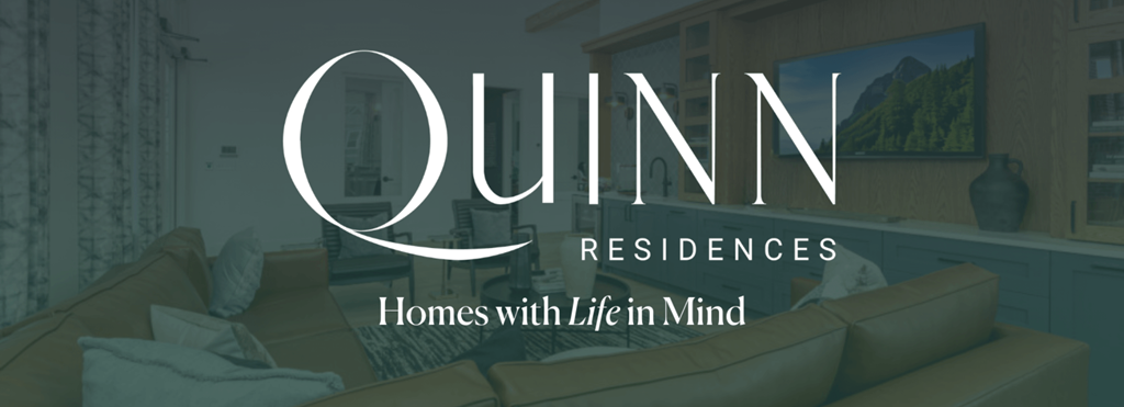 A modern living room with a sofa and a painting on the wall.