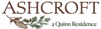 a close up of the acorn logo on a green background