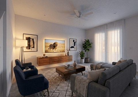 A living room with a grey couch, a blue armchair, a wooden coffee table, and a painting on the wall.