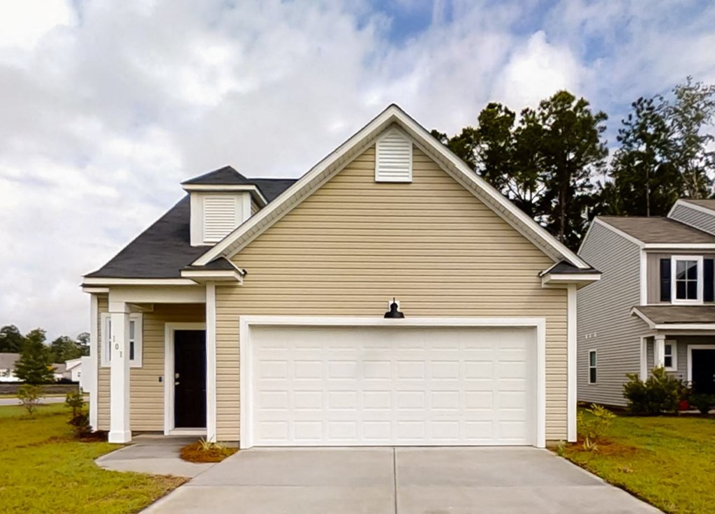 A two-car garage is attached to a house.