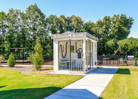 a small bathroom in the middle of a park