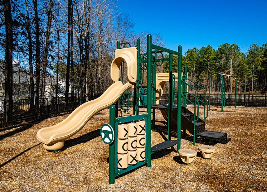 a playground with slides at a park