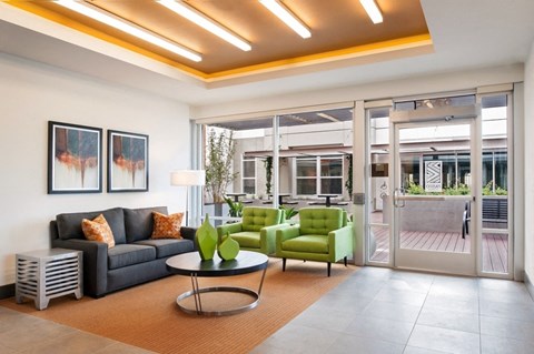 a living room with a couch and a table