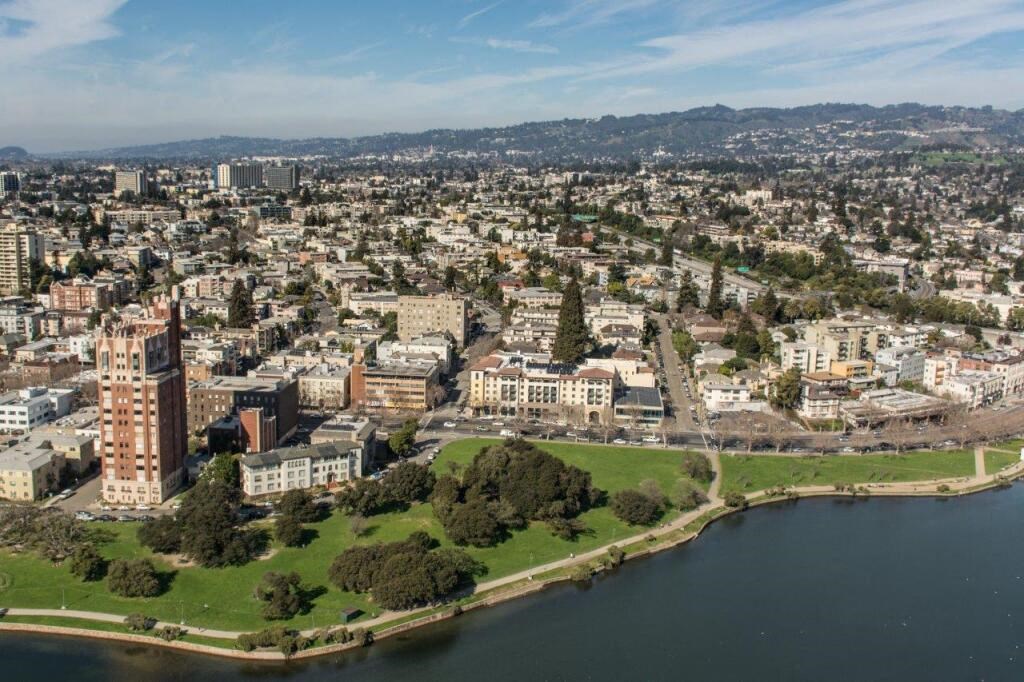 an aerial view of the city and the river