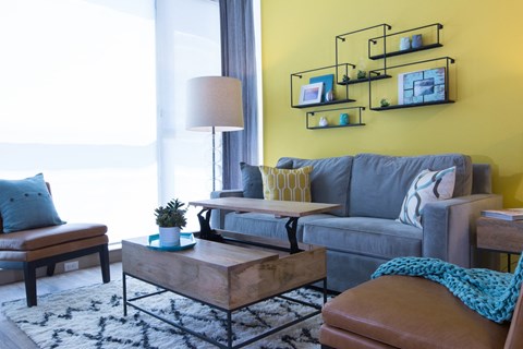 a living room with a couch and a coffee table