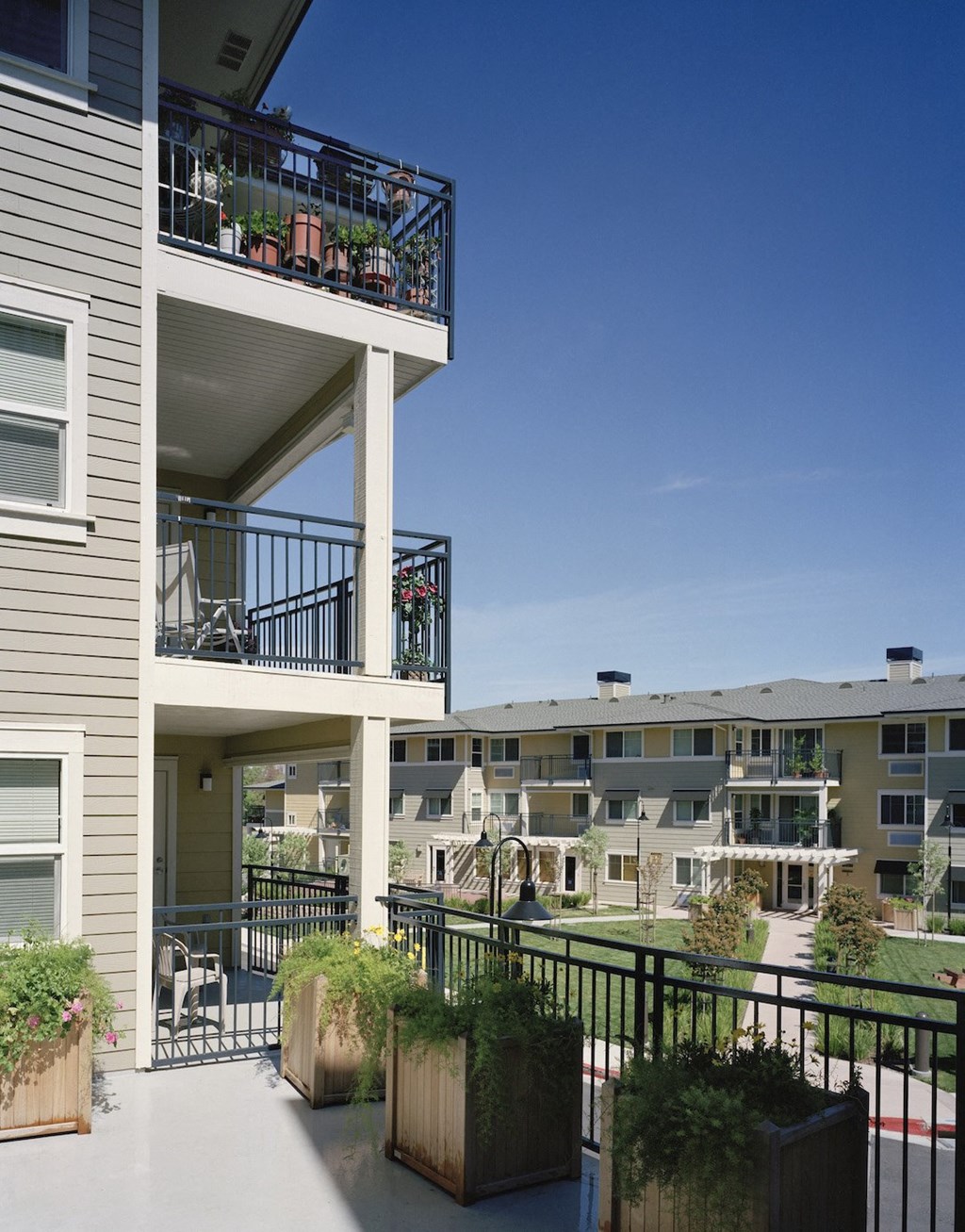 a view of the balconies of an apartment building