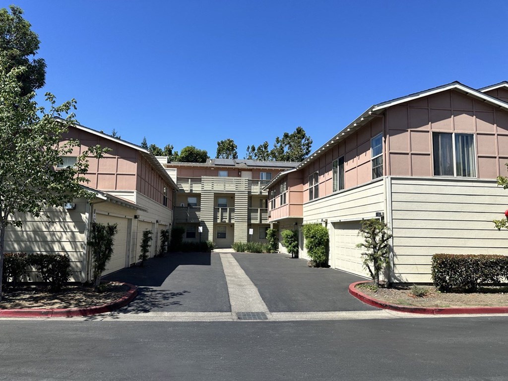a row of buildings with a street in the middle