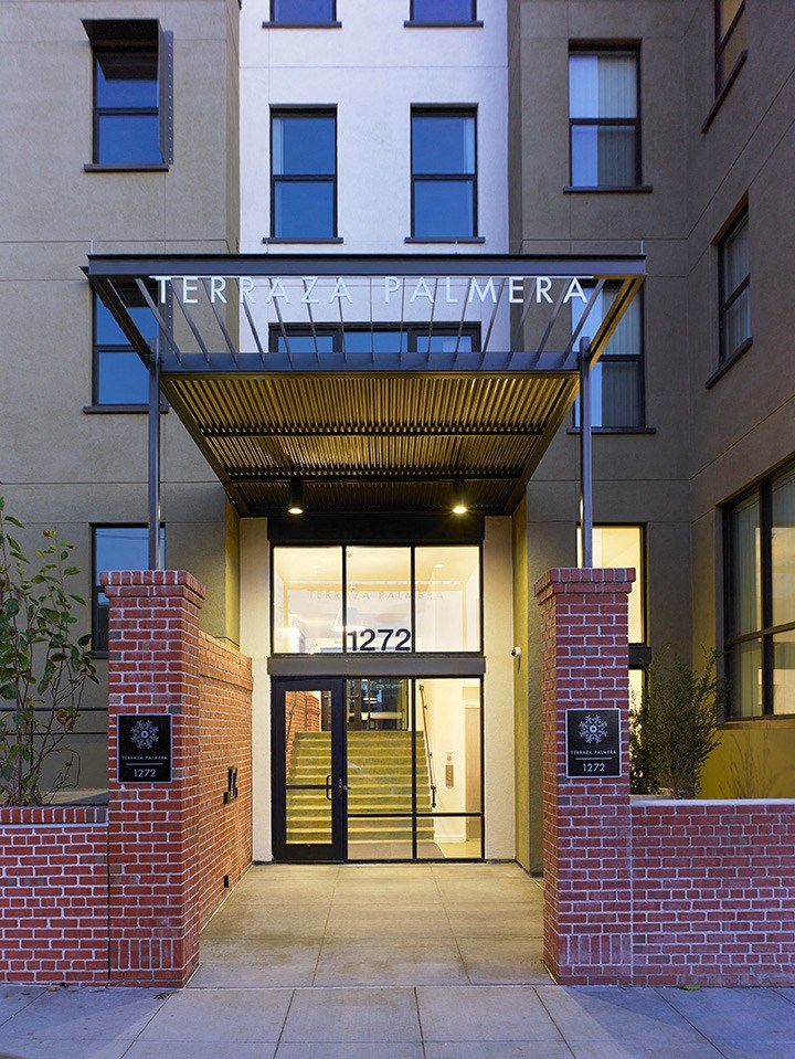a view of the front entrance of a building with a door