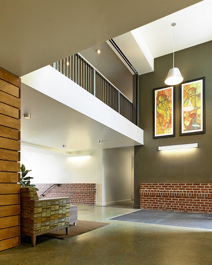 a view of the lobby of a building with a staircase