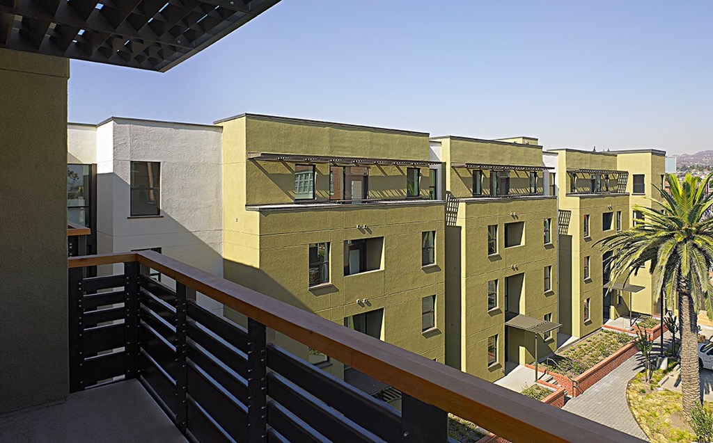 a view of a building from a balcony