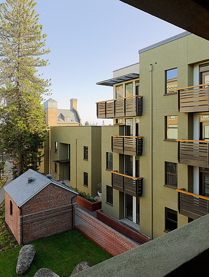 a view of an apartment building from a balcony