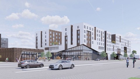 a rendering of a city street with buildings and cars