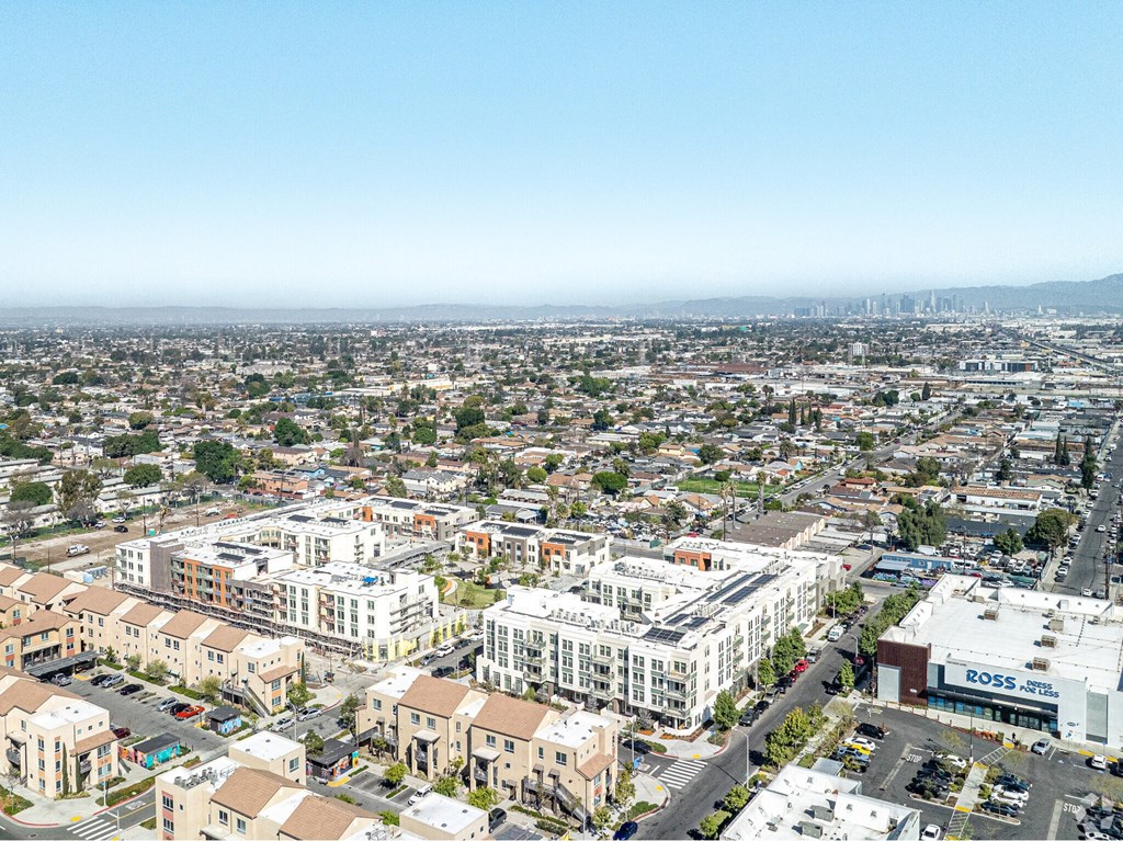 A cityscape with a clear blue sky above.