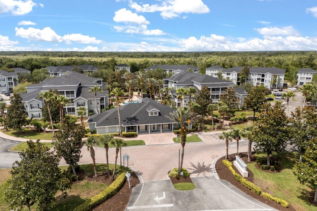 A large, well-maintained housing development with a central courtyard.