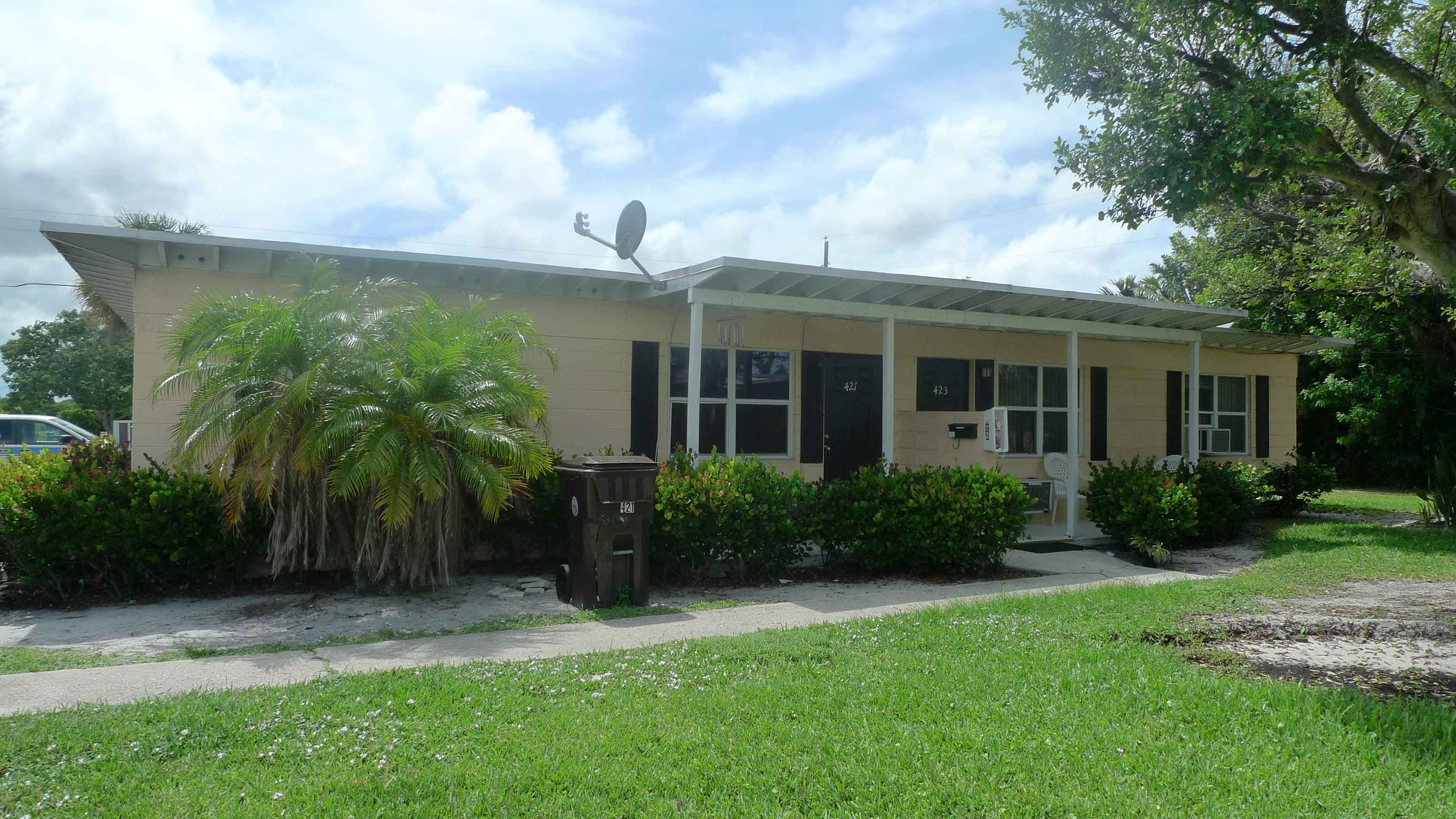 a house with a satellite dish on the roof