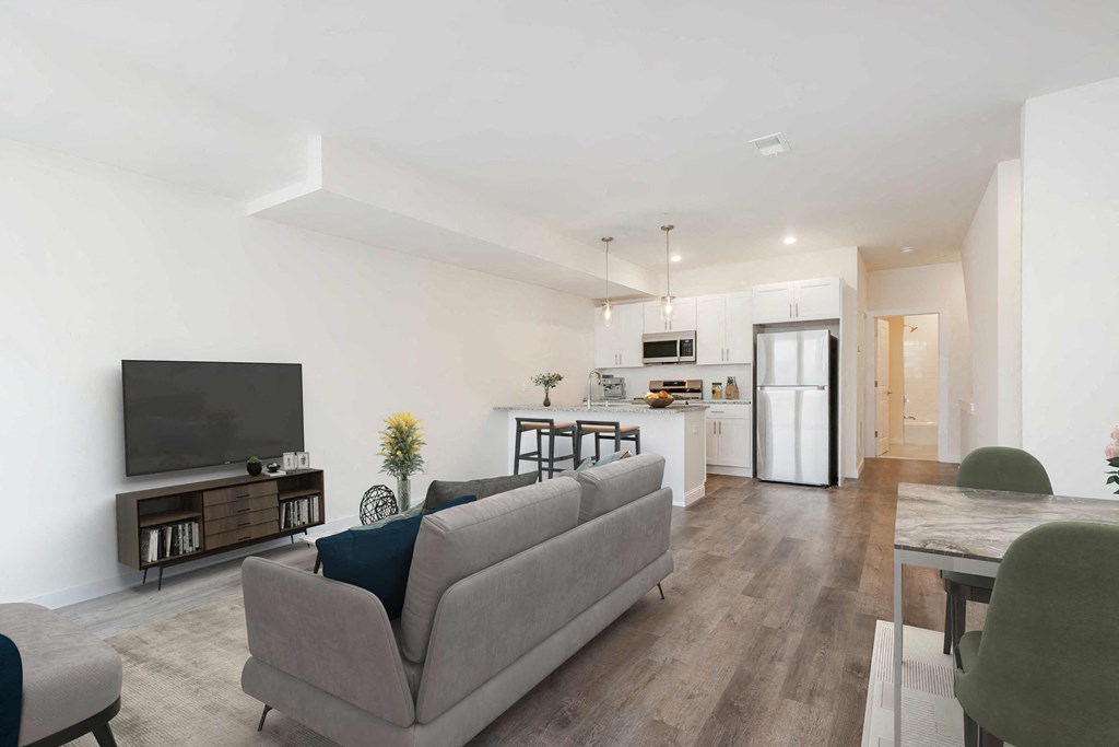 a living room with a couch and a tv