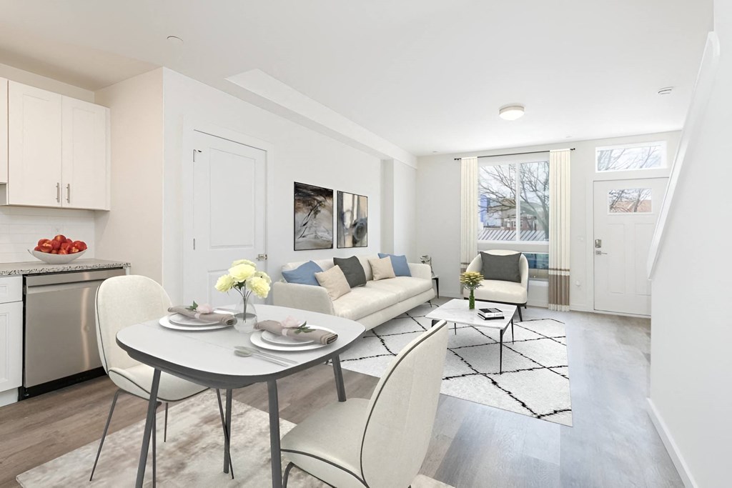 a living room with a table and a couch