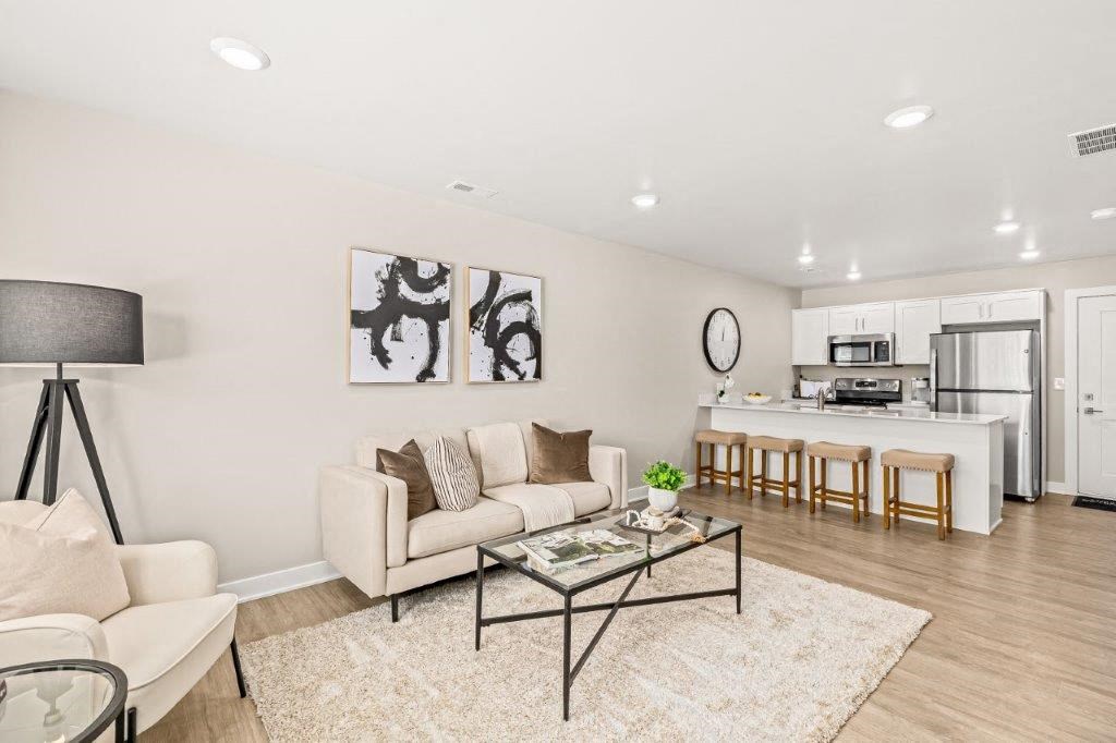 a living room with a couch and a table