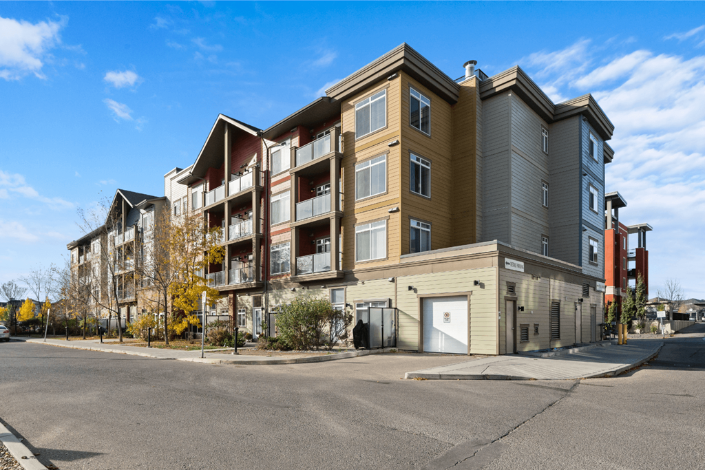 modern apartment buildings on the corner of a street