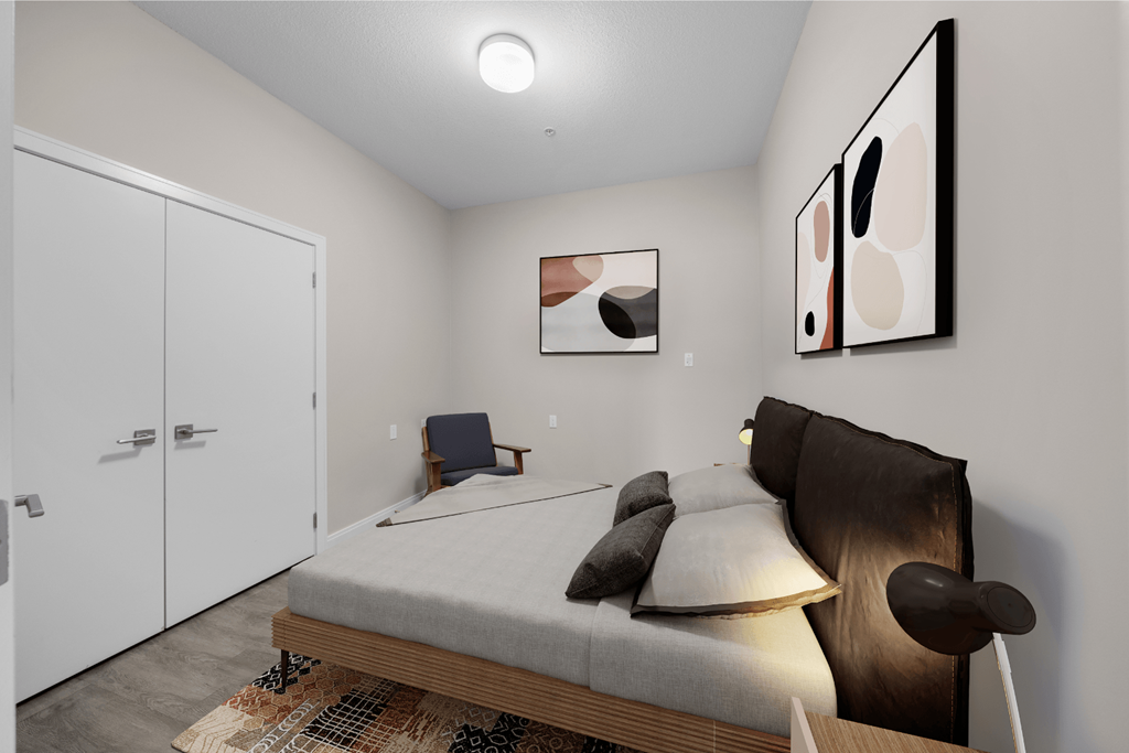 a bedroom with a large bed and a door to a closet