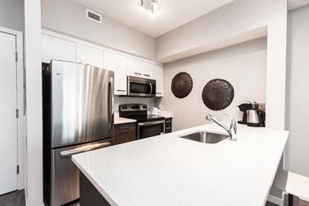 Aura residential rental property quartz countertops