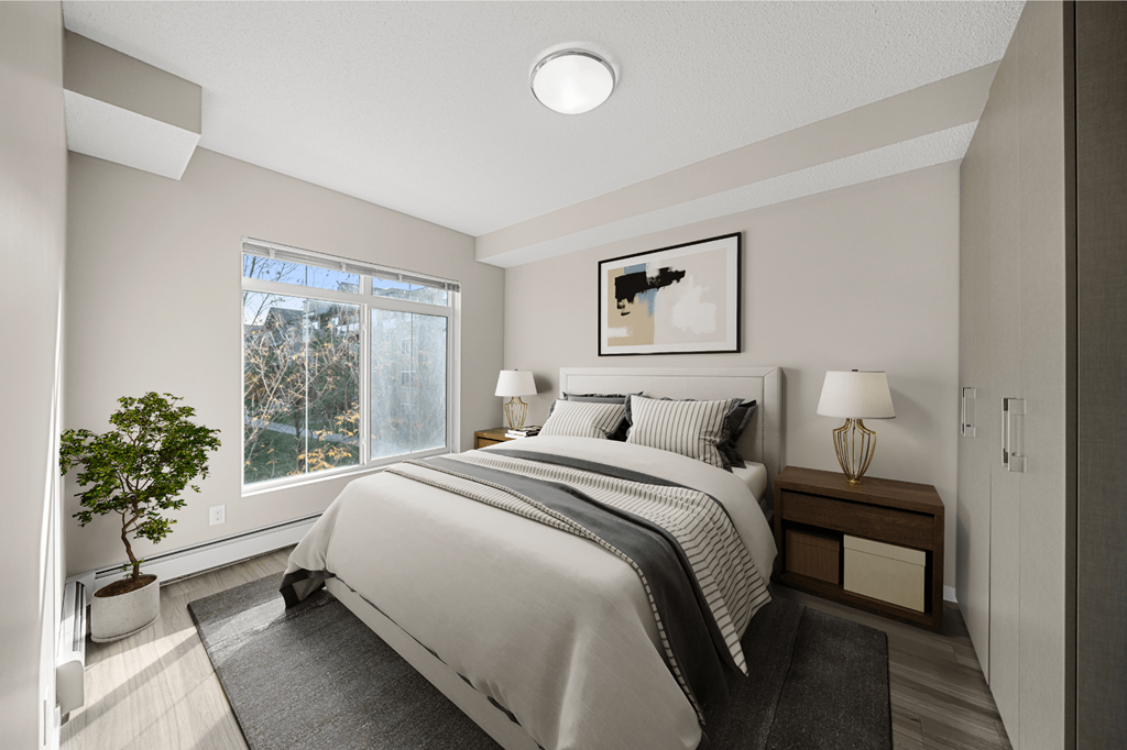 a bedroom with a bed and a window