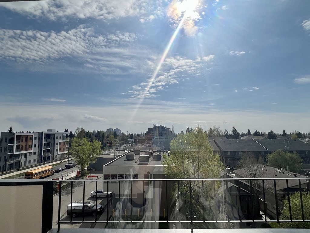 the view of the city from the balcony of our apartment building