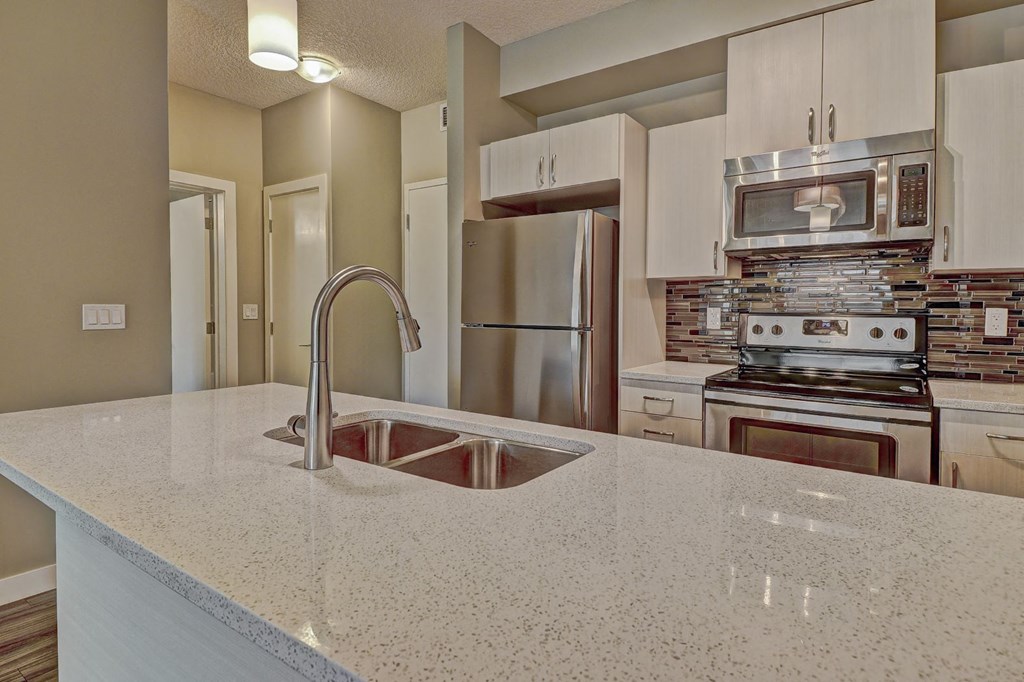 Aqua residential rental apartments quartz countertops