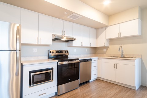 Fully Furnished Kitchen at All Saints Apartments, Colorado