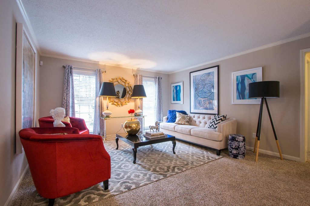 a living room with a couch and a chair