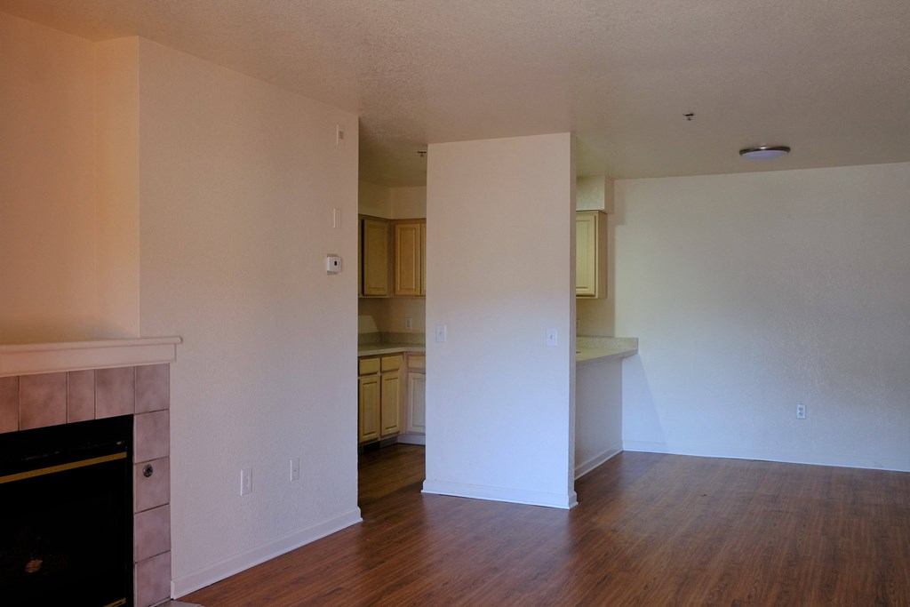 Living room with fire place and dining room