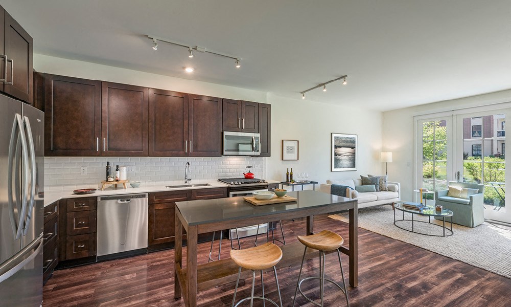 open-concept kitchen and living room layout at a Kelmscott Park apartment in Lake Forest, IL